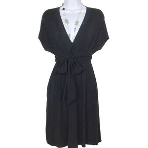 Black V-Neck Front Tie Rayon Dress by Pinkerton